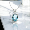 Oval-Cut Silver Solitaire Pendant with Aquamarine