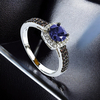 Classic Halo Tanzanite Engagement Ring