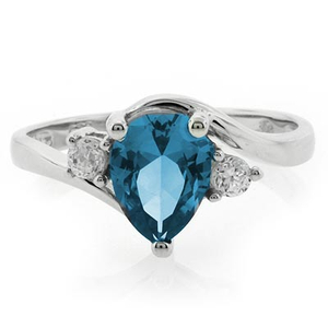 Solitaire Blue Topaz Sterling Silver Ring
