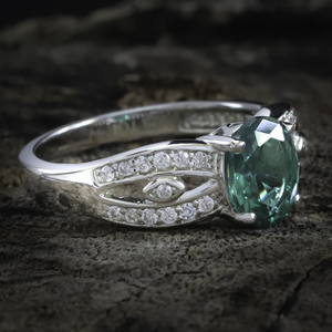Emerald Oval Cut Stone Decorated Ring
