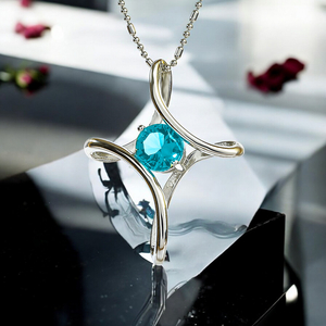 Sterling Silver Cross With Round Cut Aquamarine