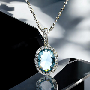 Oval-Cut Silver Halo Pendant with Aquamarine