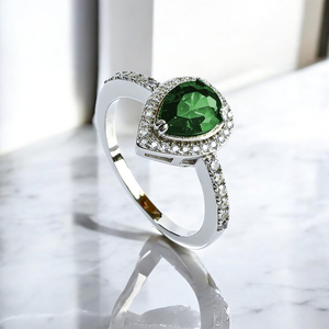 Solitaire Pear Cut Emerald Ring