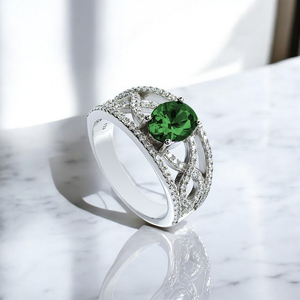 Oval Cut Emerald and Simulated Diamonds