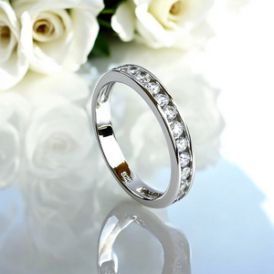 Beautiful Engagement Ring Decorated with Zirconia stones.