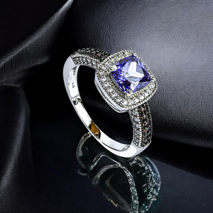 Classic Halo Tanzanite Engagement Ring