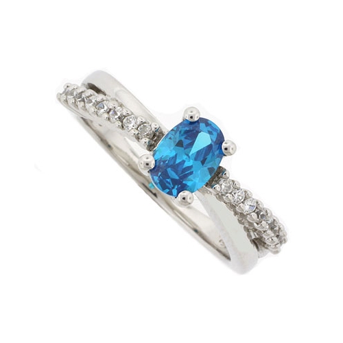 Oval Cut Blue Topaz Crossed Silver Ring