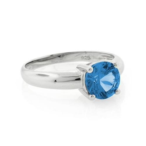 Solitaire Blue Topaz Ring