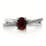 Oval Cut Ruby Crossed Silver Ring