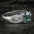 Emerald Oval Cut Stone Decorated Ring