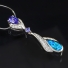 Silver Tanzanite and Opal Pendant.