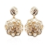 Golden Earrings In Flower Shape