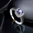 Classic Halo Tanzanite Engagement Ring
